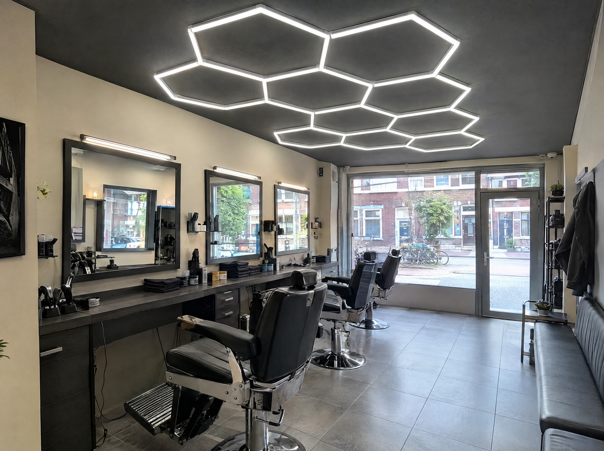 Compact neighbourhood barbershop concept with hexagon ceiling lighting